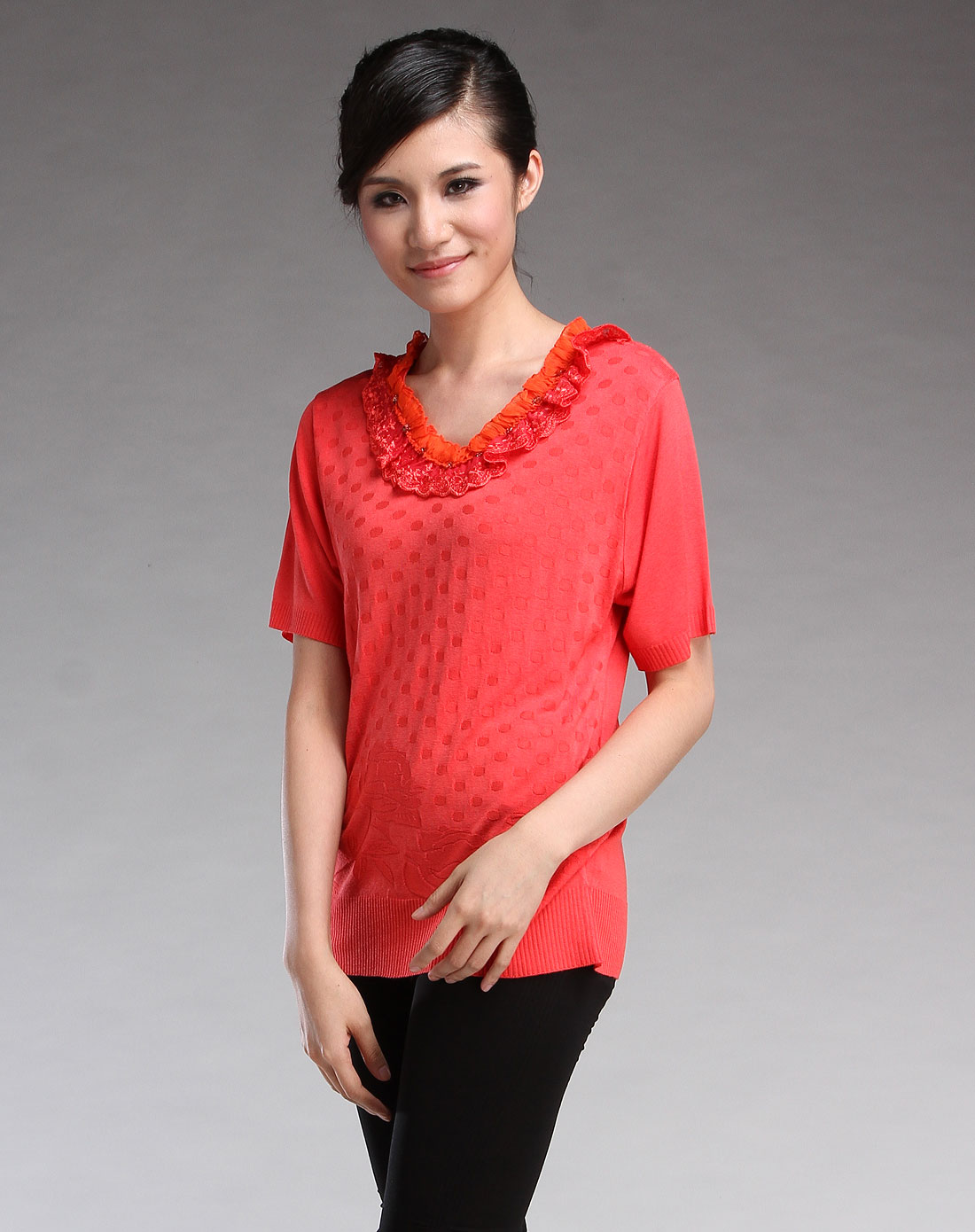 桔红色短袖针织上衣