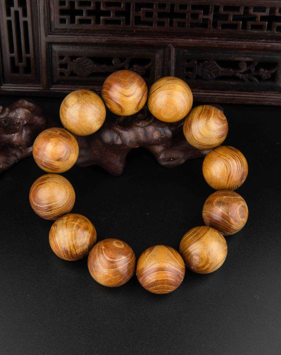 精品黄金木对眼手串