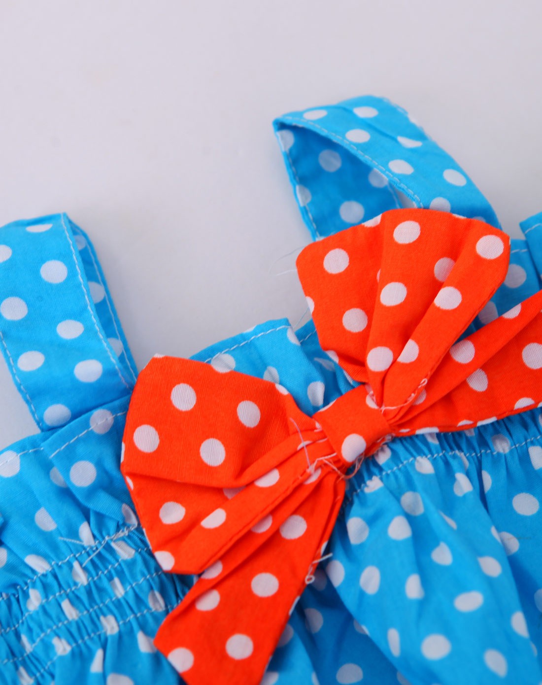 兰色棒棒糖点点蝴蝶结吊带套