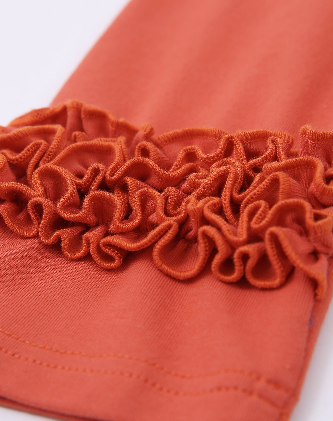 女童橘色打底裤