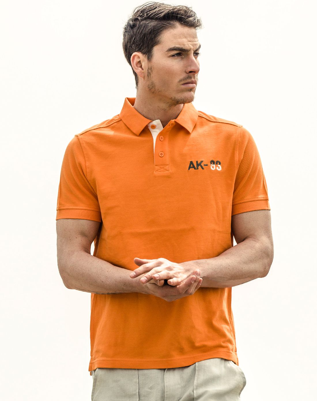 桔色复古珠地logo绣花短袖polo