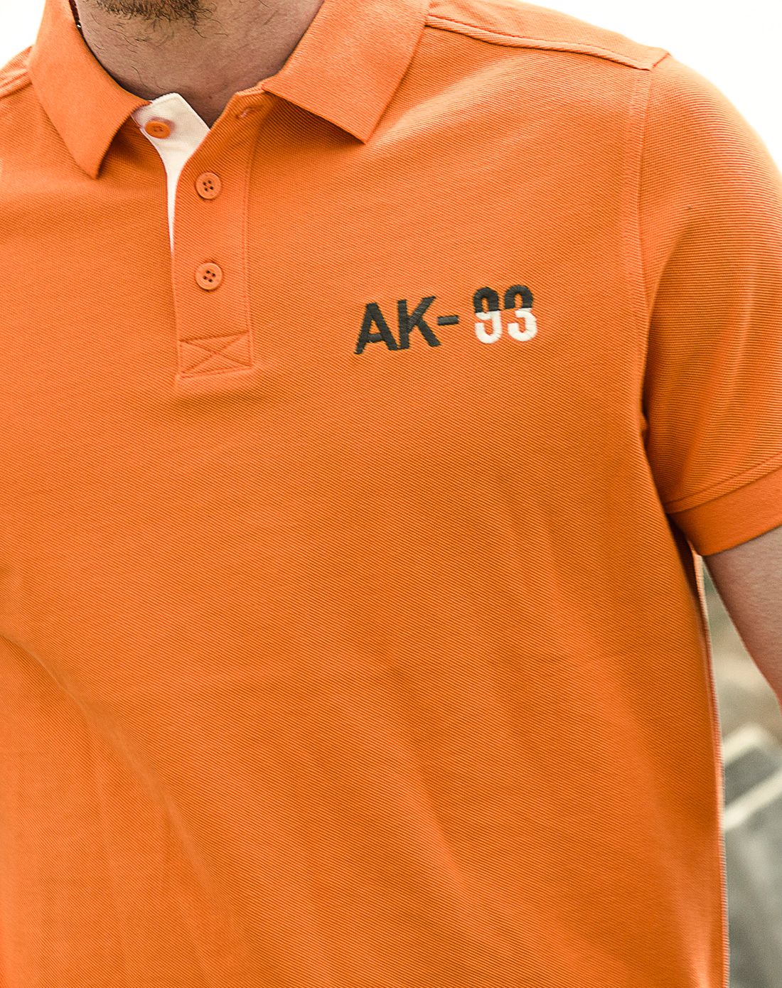 桔色复古珠地logo绣花短袖polo