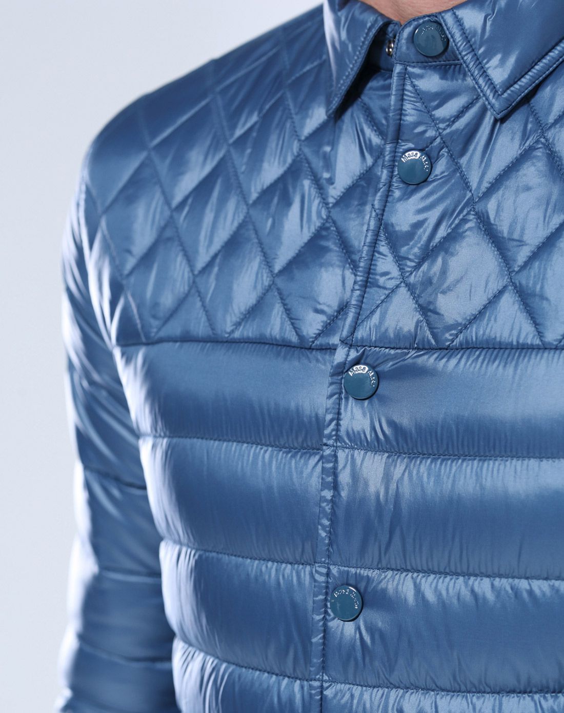 雀蓝色压格线翻领时尚保暖羽绒服