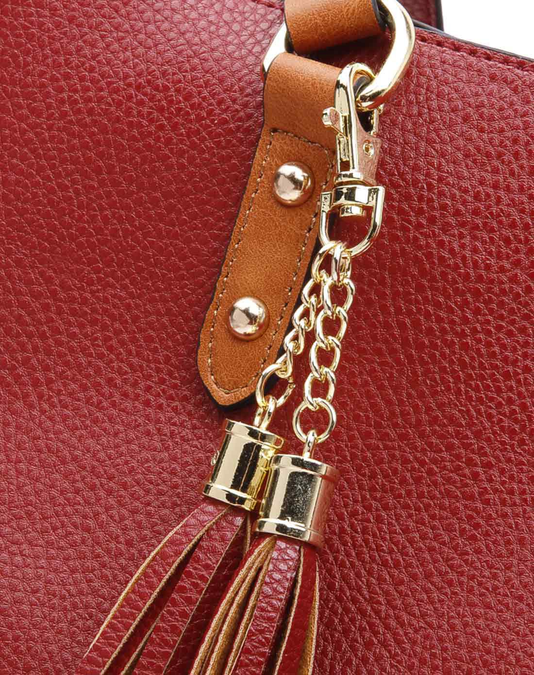 女款酒红时尚流苏单肩包