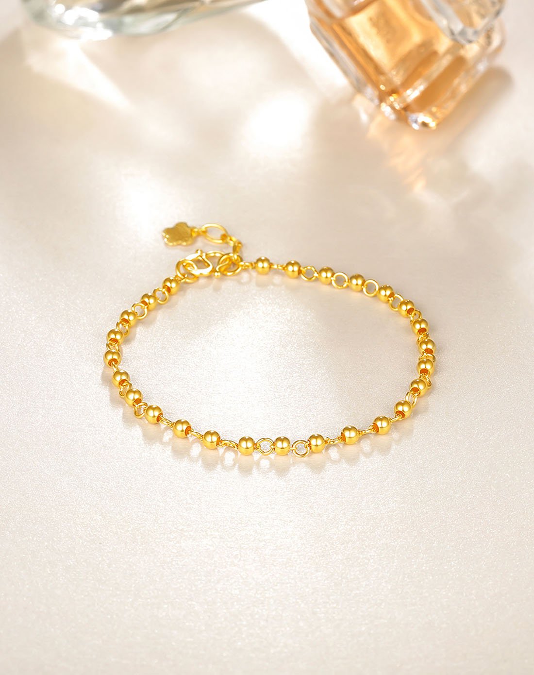 梦金园万纯 足金999.9圆珠黄金手链(计价/加长链花型随机)