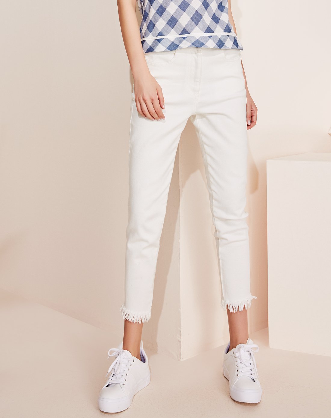 2018夏装新品休闲时尚修身束腿裤脚毛边九分牛仔裤