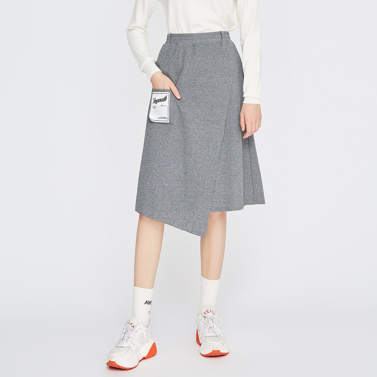 印花贴布立体分割不对称下摆a型半身裙女