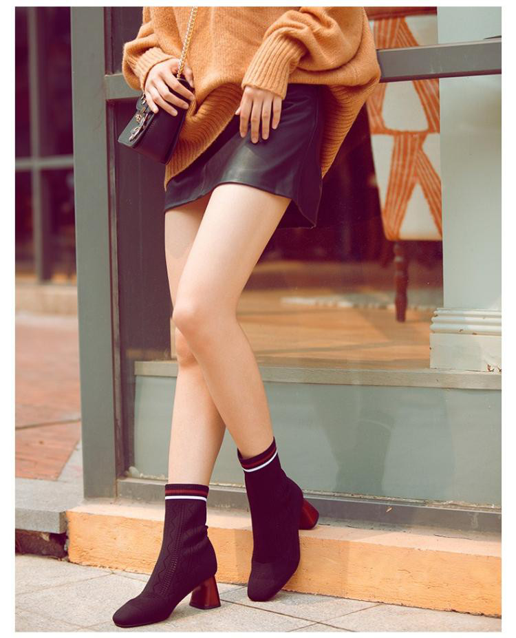 百丽冬季专柜同款针织帮面粗跟女中靴袜靴黑色